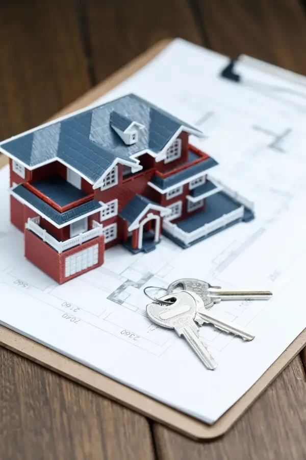 villa-house-model-key-drawing-retro-desktop-real-estate-sale-concept